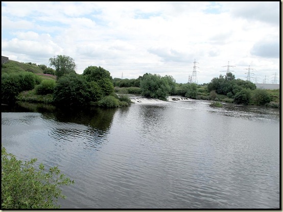 The River Mersey drains into the Manchester Ship Canal at Irlam