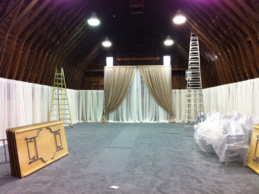 Extra tall panels covered the basketball hoop and created a focal point for the dessert and lounge area of the reception.