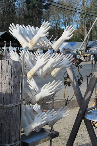 A rack of plaster arms.