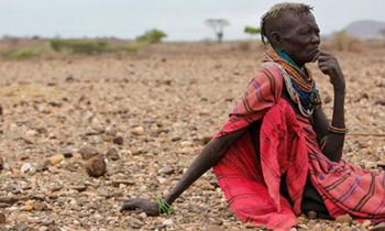 An Turkana woman sits in north-western Kenya. The price rises of food have been particularly severe in Africa. Dai Kurokawa / EPA via The Guardian