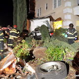 Early Saturday morning, a SacCityFire Medic unit was responding to a "medical aid" call according to Jonathan Williams, Batalion Chief. When the medic unit arrived they found a vehicle into a residential structure with two people trapped.
Additional fire units and medics were dispatched, the occupants of the vehicles were extricated and transported to the hospital in unknown condition.
The woman inside the structure had been in the kitchen just ten minutes before the vehicle came crashing into it. She was on her way to bed the incident occurred. She had been packing to move in the next few days according to Williams.
Williams stated there was aparent exsessive speed involved but unknown if alcohol was a factor.
Sacramento Police Department was on scene investigating. News_120225_VehicleIntoHouse_#121450