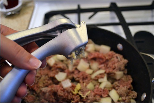 garlic press in action