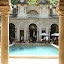 Inside the house, a pool you wanted to jump in, a cafe and randomly...