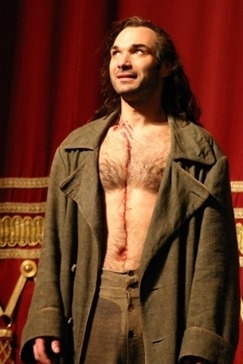 Nikolai Schukoff at the curtain call after a 2008 Bayerische Staatsoper PARSIFAL, in which he sang the title rôle [Photo used with the artist's permission; photographer uncredited]
