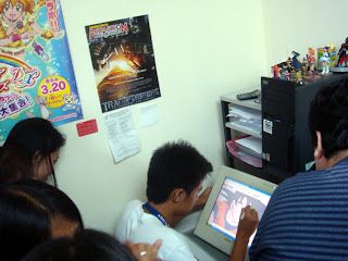 March 11: Kurt Patrick practices how to draw in computer screen.