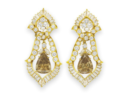 A Set of Cognac Diamond Earrings by Van Cleef & Arpels,
Gift from Richard Burton. Estimate: $100,000‐150,000 A Set of Cognac Diamond Earrings by Van Cleef & Arpels,
Gift from Richard Burton. Estimate: $100,000‐150,000