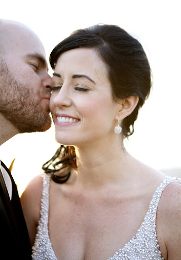 Hair and makeup artist Tiffany Lowry, of Tiffany Colors, created two bridal looks. For the ceremony, we aimed for soft and classic hair and makeup. Here's a close-up, featuring my new favorite lip gloss, Trish McEvoy's Instant Pick Me Up. Hair and makeup artist Tiffany Lowry, of Tiffany Colors, created two bridal looks. For the ceremony, we aimed for soft and classic hair and makeup. Here's a close-up, featuring my new favorite lip gloss, Trish McEvoy's Instant Pick Me Up.
