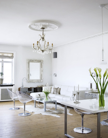 The silver bases on the chairs adds subtle color.