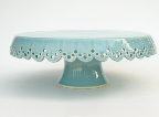 This scalloped aqua cake stand by Jeanette Zeis Ceramics is the perfect shade of blue (www.etsy.com/shop/vesselsandwares).