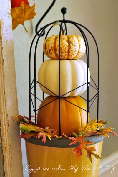 Pumpkin topiary with dollar store pumpkins Pumpkin topiary with dollar store pumpkins