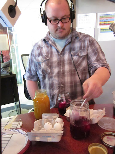 Chris placed hard boiled eggs into every jar.