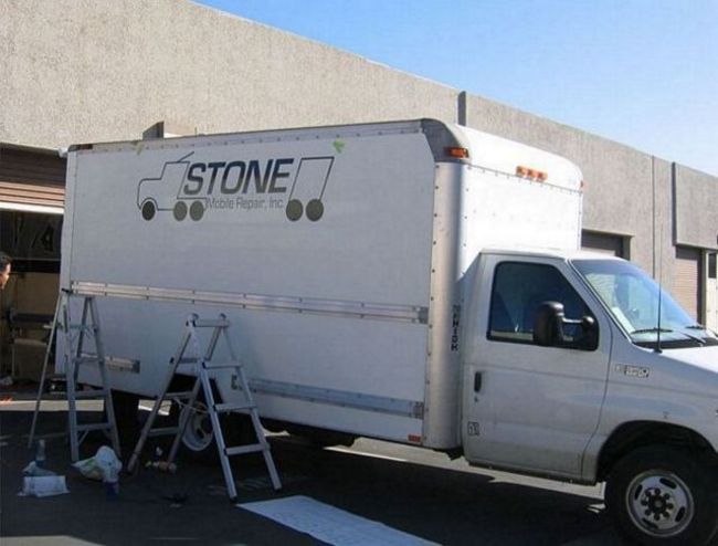 Cut vinyl lettering on box truck
