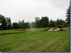 2382 North Dakota USA & Manitoba Canada - International Peace Garden - Canadian & American flags