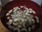Soak one cup of raw, unsalted cashews in water for 8+ hours. I buy them in bulk online for $6/lb and store them in my fridge so I can make milk anytime I want.