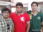 Reader Manali Doshi's friends Monil Gosalia (in checks shirt), Jatin Jajodia (in green t-shirt) with R Madhavan [ Images ] at Mumbai airport.