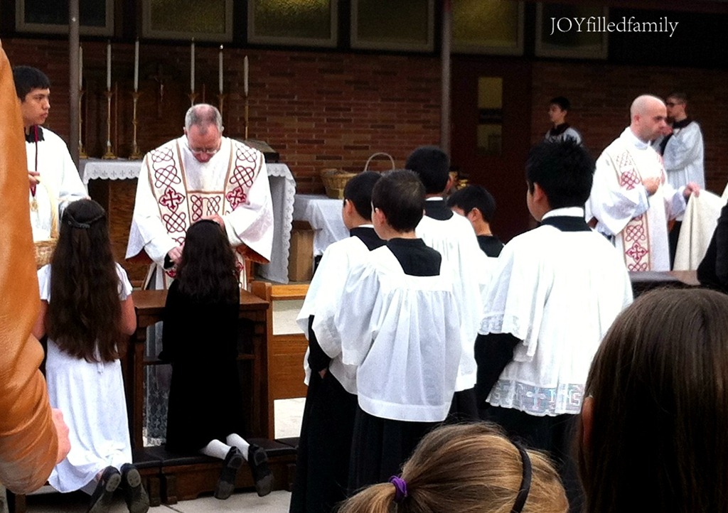 [E%2520receiving%2520blessed%2520candle%25202.2.13%255B5%255D.jpg]