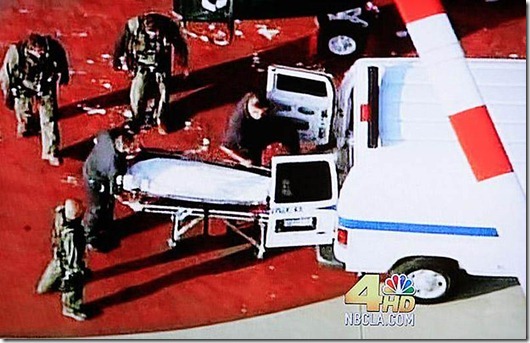 Body of Michael jackson is loaded into coroners van in Los Angeles...In this video frame grab from KNBC4 video, the body of pop singer Michael Jackson is loaded into a van to be taken to the Los Angeles County Coroner's office June 25, 2009. Michael Jackson, the child star turned King of Pop who set the world dancing but whose musical genius was overshadowed by a bizarre lifestyle and sex scandals, died on Thursday. He was 50. REUTERS/KNBC4/Handout (UNITED STATES OBITUARY ENTERTAINMENT IMAGES OF THE DAY) MANDATORY CREDIT - BUG MUST NOT BE CROPPED OR ALTERED QUALITY FROM SOURCE