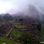 Wayna Picchu mysteriously shrounded in cloud behind Machu Picchu