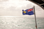Here, the Turks and Caicos flag flaps in the wind. Here, the Turks and Caicos flag flaps in the wind.