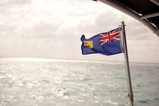 Here, the Turks and Caicos flag flaps in the wind. Here, the Turks and Caicos flag flaps in the wind.
