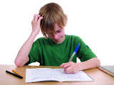 boy_doing_homework-300x225.jpg