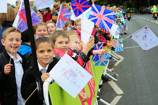 Schoolchildren out in force to cheer on the riders