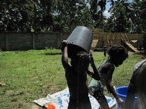 Manuel cooling off with his bucket of water.