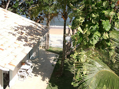 Picture of Os arredores da Pousada Pé na Areia. Photo number 3798412810 by Pousada Pé na Areia - Charming, fully decorated sea facing chalets located on Boiçucanga beach, on São Paulo northern shore. Boiçucanga is a beach with calm waters and woundrous sunset, surrounded by the Atlantic Rainforest and by very good restaurants. There also is a complete services infrastructure that includes supermarkets and shopping malls. You can find all that and much more at “Pé na Areia” (aka “Esquina da Mentira”), the perfect place for spending your vacations and weekends, or even having your own house at the sea.