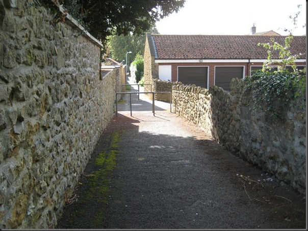 Looking down Brewery Lane.  Our prefab  was probably just past these modern garages on the right