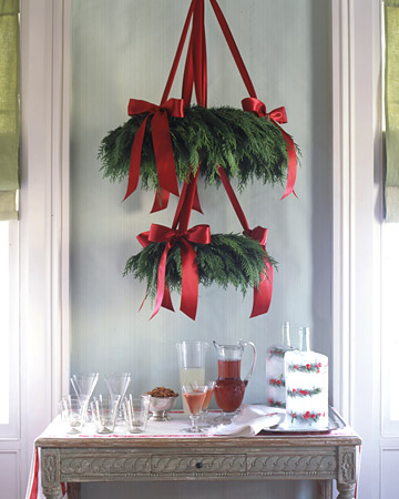 This overhead centerpiece looks grand and complicated, but it only takes two wreaths and beautiful satin ribbon to make this wreath This overhead centerpiece looks grand and complicated, but it only takes two wreaths and beautiful satin ribbon to make this wreath