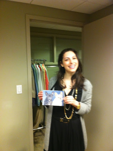 In fact, here she is: Show assistant Allie Wyman poses with the painting that Daily Wag reader Delia sent me to give to Martha.
