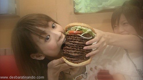 japanese girl eating a mega hamburger