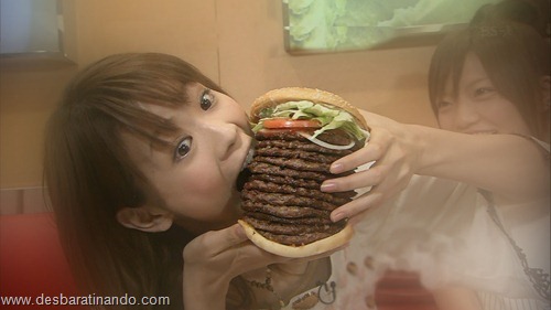 japanese girl eating a mega hamburger japanese girl eating a mega hamburger