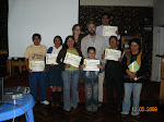 Handing out certificates, Inca Baths, Peru