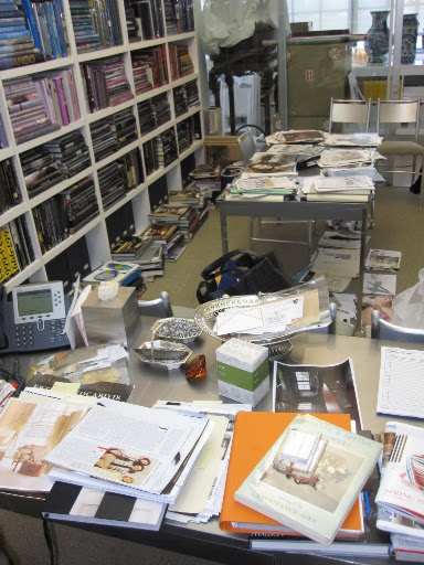 So many books need to be put back on my shelves, until they are organized they are stacked on the floor of my office.