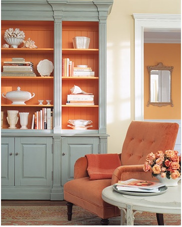 Shades of orange everywhere, even in the floral arrangement.