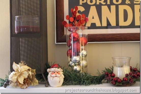 Christmas mantel Christmas mantel, ornaments in a vase