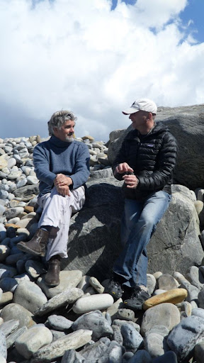 John and Sean take a break on the rocky coastline.