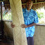 Our Guide Holds Up A Woven Mat:  Most Last 10-15 Years - Suva, Fiji