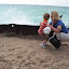 Enjoying the waves at breakwall next to Pointe Betsie Lighthouse. – 02-Aug-2010 Enjoying the waves at breakwall next to Pointe Betsie Lighthouse. – 02-Aug-2010