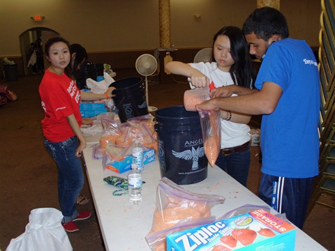Alliance volunteers in Houston filling AICB buckets for flood affected families in Sinhd Pakistan (95) Alliance volunteers in Houston filling AICB buckets for flood affected families in Sinhd Pakistan (95)
