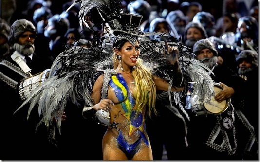 A dancer of the Gavioes da Fiel samba school performs in Sao Paulo. (Andre Penner/Associated Press)