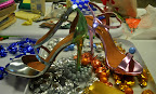 Shimmering heels from Schutz  (http://www.piperlime.com/products/schutz-shoes.jsp) taking a break for candy.