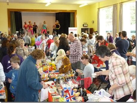 Fete - inside the Church hall - Zumba on stage and various stalls