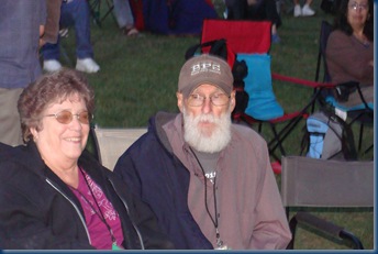 Cathy and (a startled) Earl Banton enjoying great Bluegrass at Graves