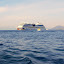 The AIDABella as seen from Cannes. The harbor isnt large enough for a vessel of this size, so the ship anchors about half a mile off shore and passengers are ferried with the fleet of shuttle boats.