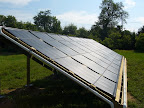 Solar pool installation on a ground rack.