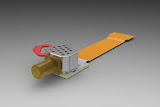 Pictured is a Receive Optical Sub-Assembly, known in the Photonics world as a ROSA, which houses a 4-channel, filter-based optical demultiplexer, working at 3.13Ghz per channel, at 4 channels, resulting in a 10Gbit throughput receive path.  This ROSA was designed to work within XenPak and X2 transceiver form-factors.