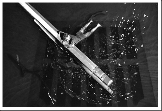 90. Scott holds onto debris