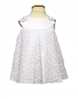 Your little flower girl won't mind wearing this breezy eyelet sundress from Petit Tresor (www.petittresor.com).